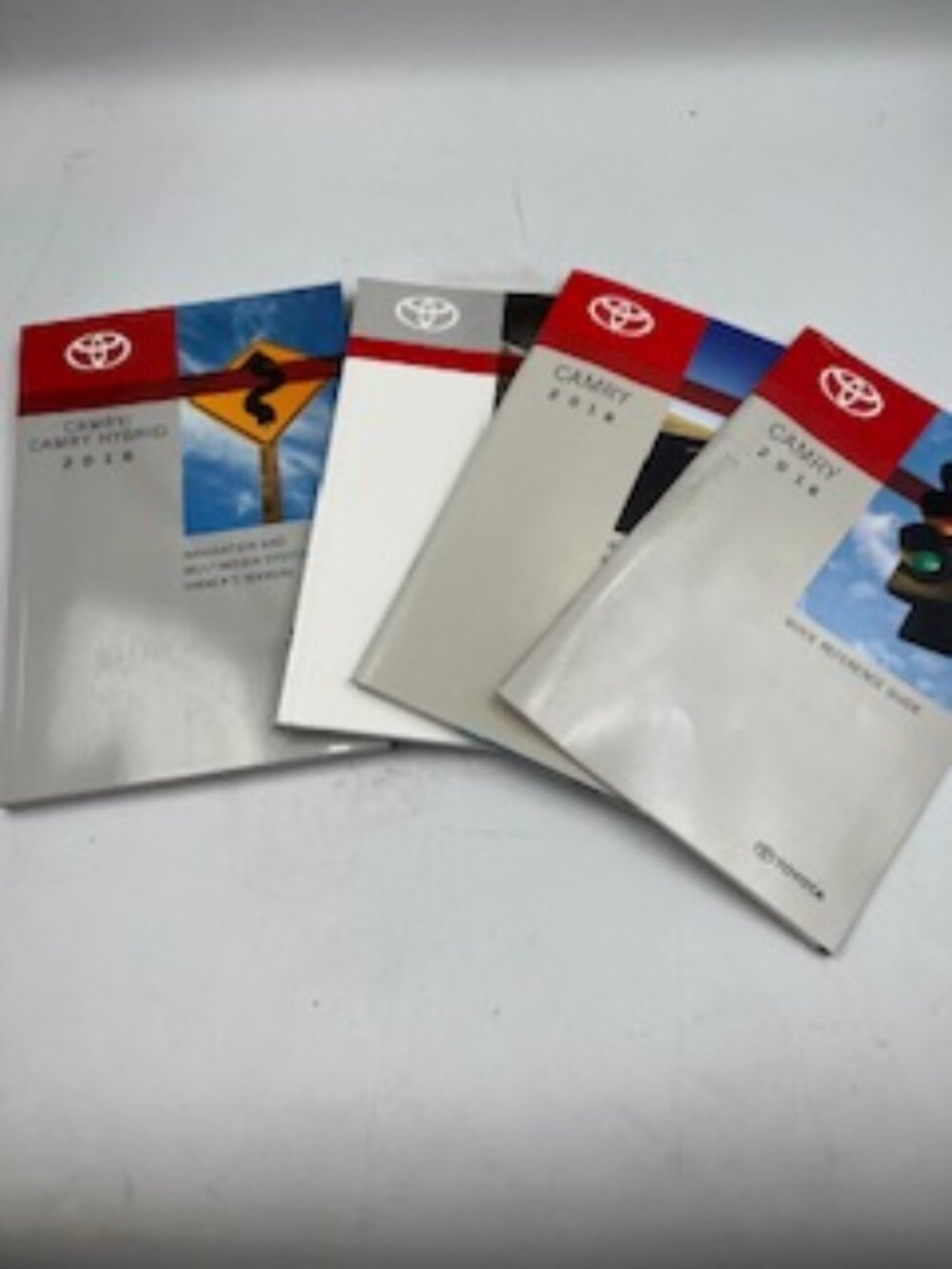 Toyota Camry/ Camry Hybrid owner’s Manuals 2016 set of 4 books